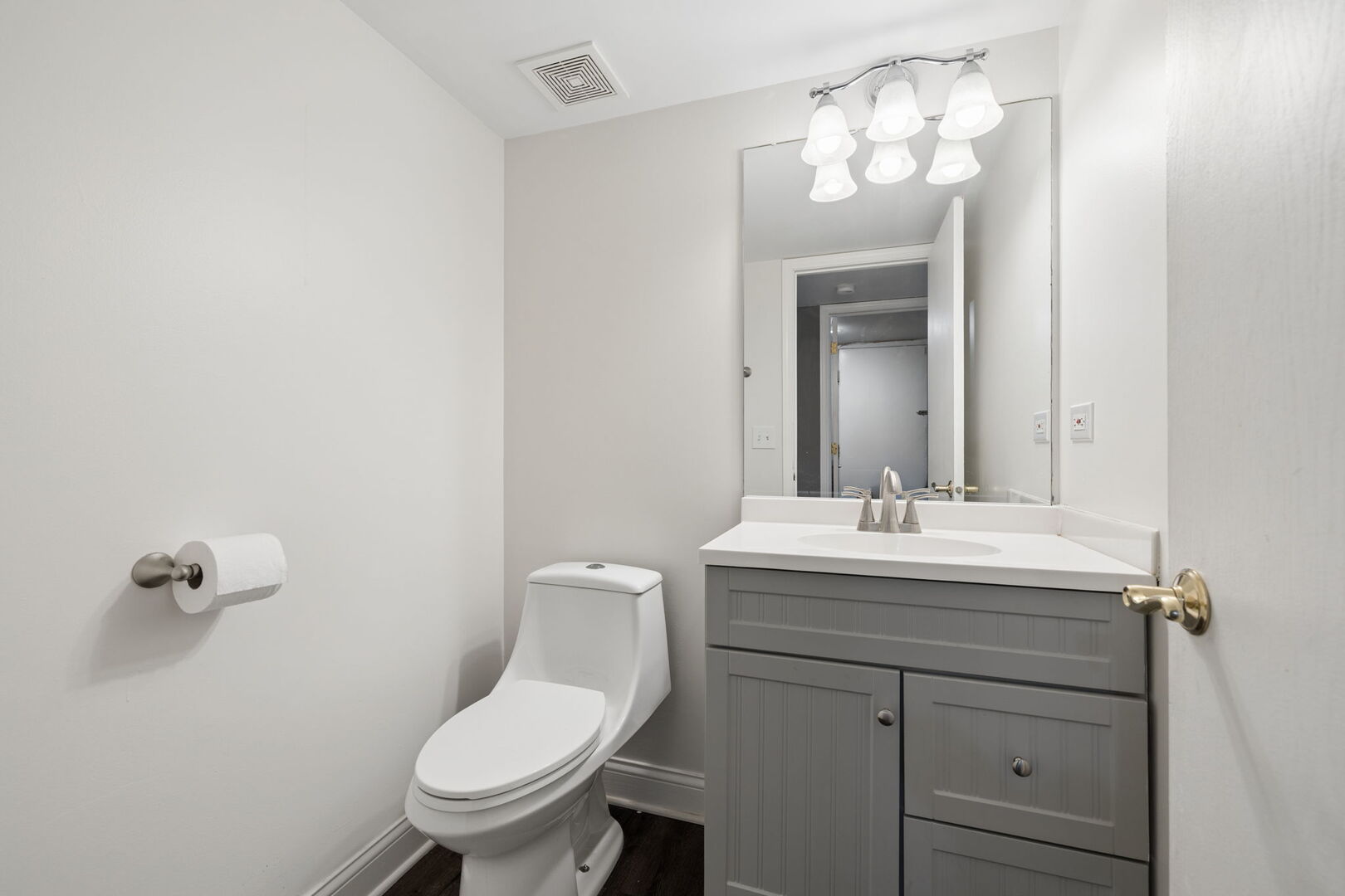 740 Countryside Drive Bolingbrook, IL 60490 - Photo 12 of 29 a bathroom with a toilet sink and mirror