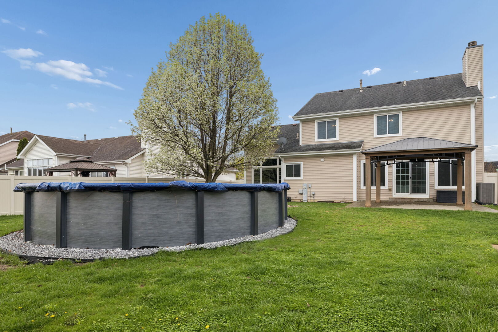 740 Countryside Drive Bolingbrook, IL 60490 - Photo 27 of 29 a view of a yard in front of a house