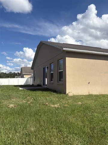 a house view with a garden space
