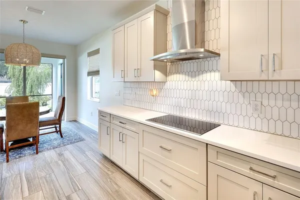 a view of a living room and dining room
