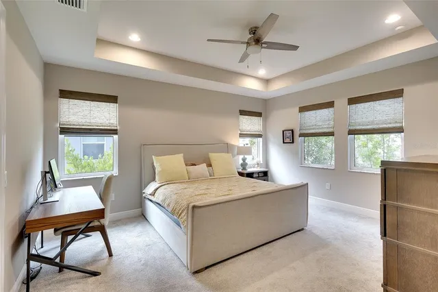 a bed room with a bed and dresser