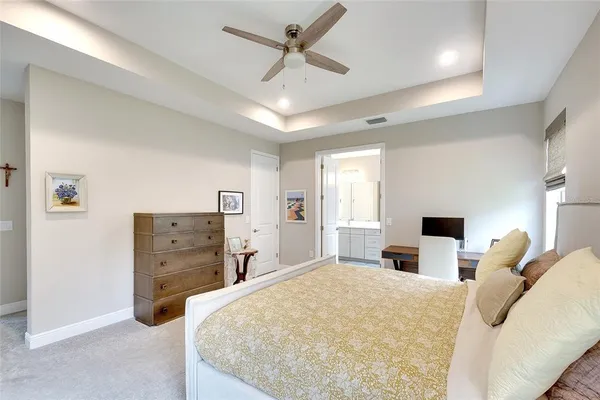 a bathroom with double sink and a mirror