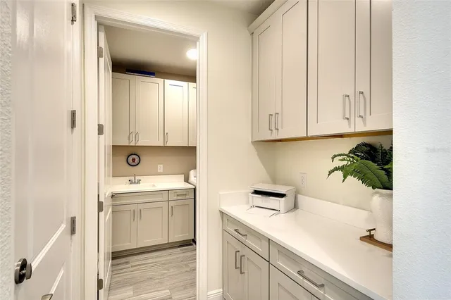 a bathroom with a sink and a vanity
