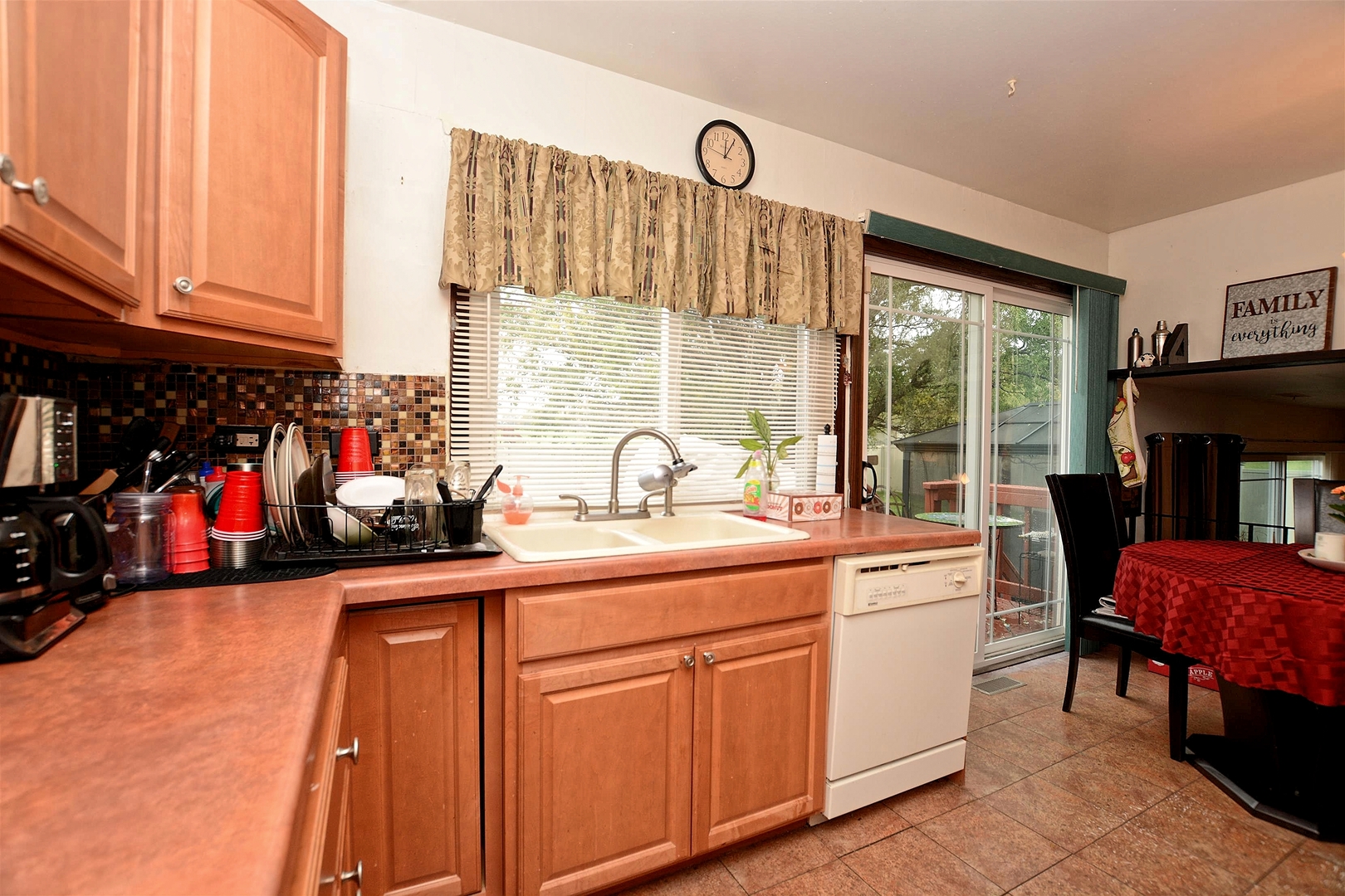 500 Farmview Road University Park, IL 60484 - Photo 14 of 27 a kitchen with stainless steel appliances granite countertop a sink and cabinets