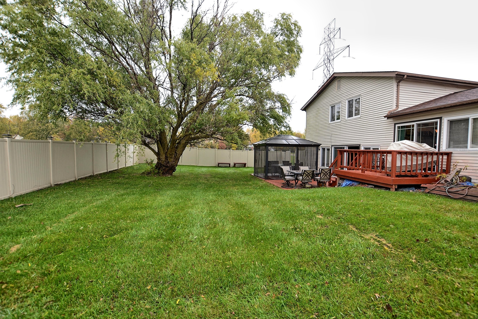 500 Farmview Road University Park, IL 60484 - Photo 4 of 27 a view of a house with a backyard and chairs