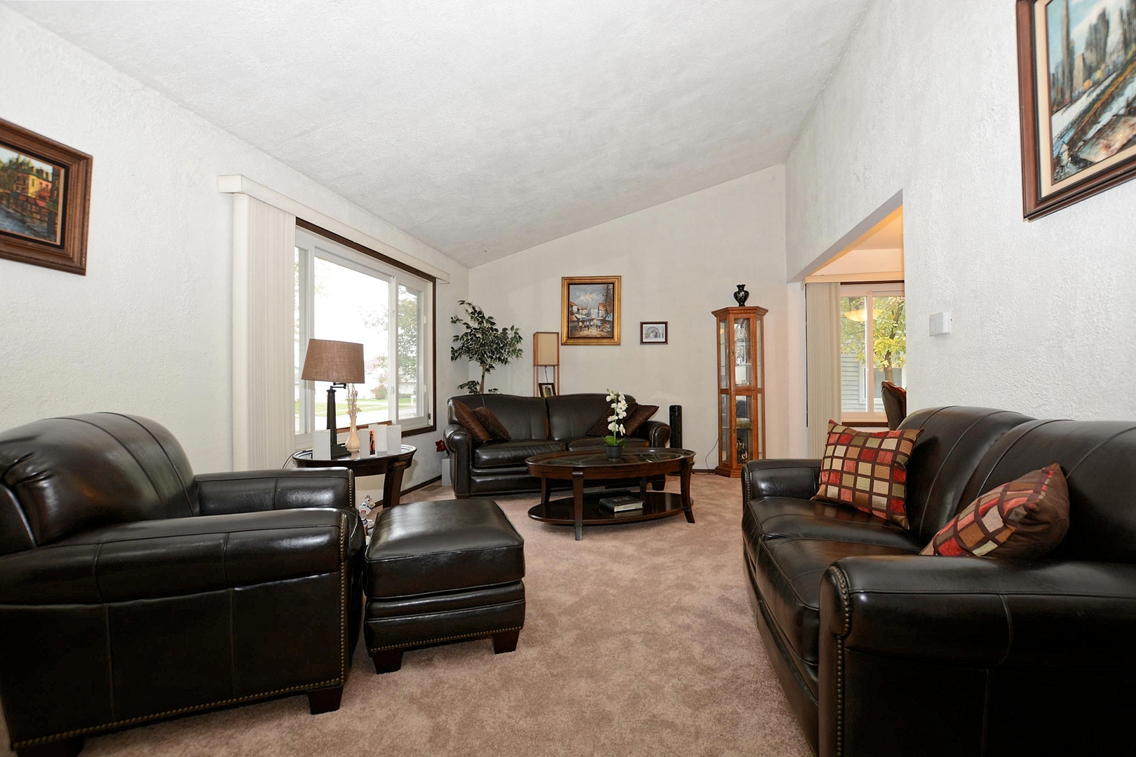 500 Farmview Road University Park, IL 60484 - Photo 5 of 27 a living room with furniture and a flat screen tv