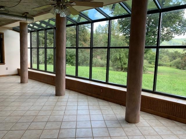 12002 Jackson River Road Monterey, VA 24465 - Photo 13 of 38 a view of an empty room with a window
