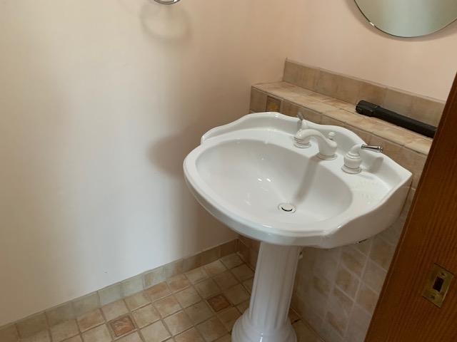 12002 Jackson River Road Monterey, VA 24465 - Photo 17 of 38 a bathroom with a sink and a mirror