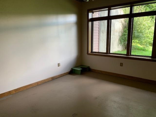 12002 Jackson River Road Monterey, VA 24465 - Photo 18 of 38 an empty room with a window