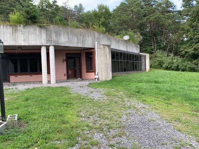 12002 Jackson River Road Monterey, VA 24465 - Photo 2 of 38 a view of a house with backyard and garden