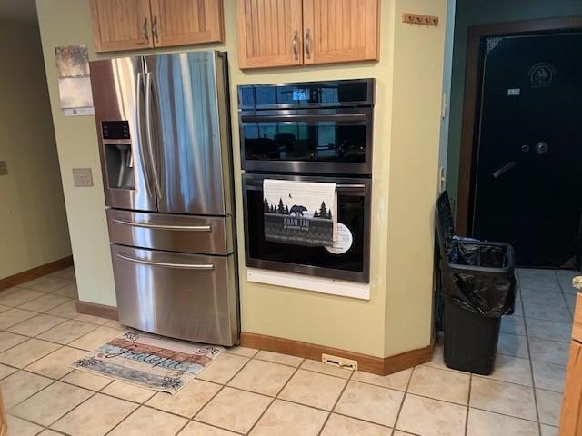 12002 Jackson River Road Monterey, VA 24465 - Photo 23 of 65 a metallic refrigerator freezer sitting in a kitchen