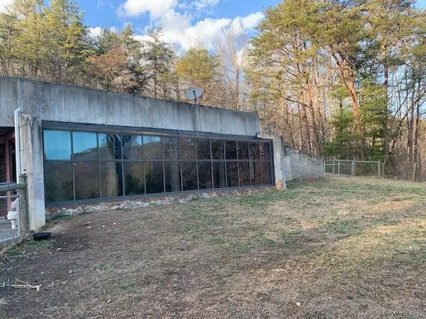 a backyard of a house with lots of green space