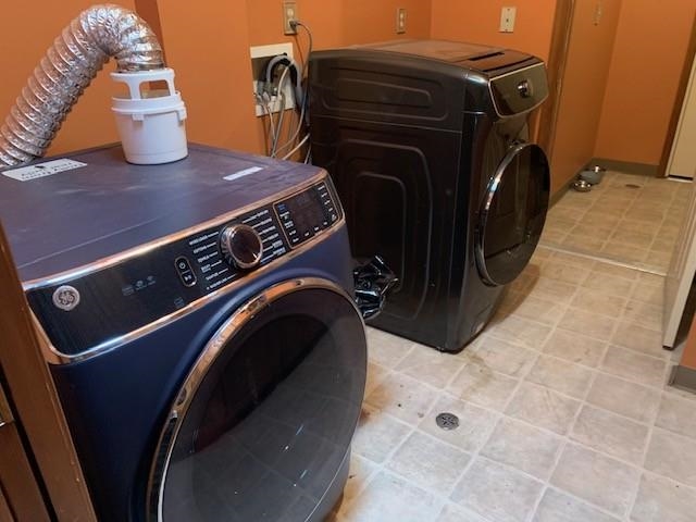 12002 Jackson River Road Monterey, VA 24465 - Photo 32 of 65 a utility room with dryer and washer