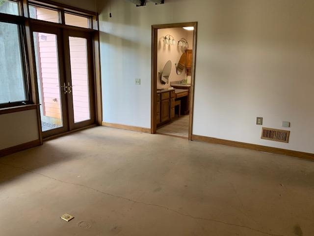 12002 Jackson River Road Monterey, VA 24465 - Photo 32 of 38 an empty room with windows