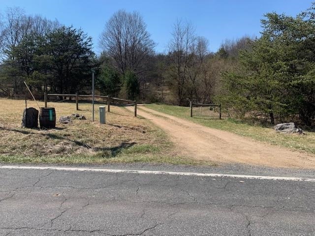 12002 Jackson River Road Monterey, VA 24465 - Photo 50 of 65 a backyard of a house with large trees
