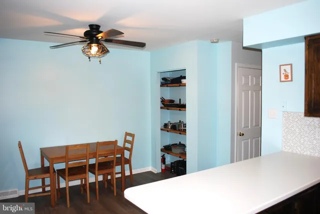 a view of a dining room with furniture