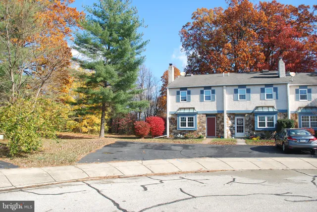 a front view of a building with street view