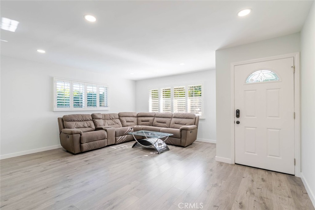 18301 Minnehaha Street Porter Ranch, CA 91326 - Photo 7 of 32 a living room with furniture and a window