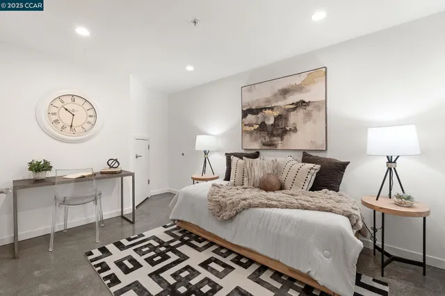 a bed room with a bed and a chandelier