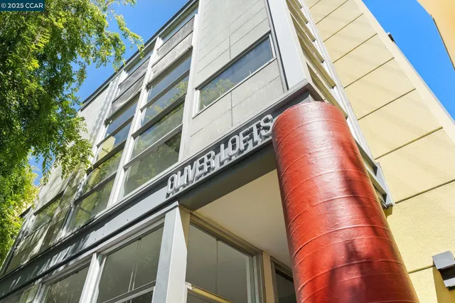 a yellow building with a outdoor space