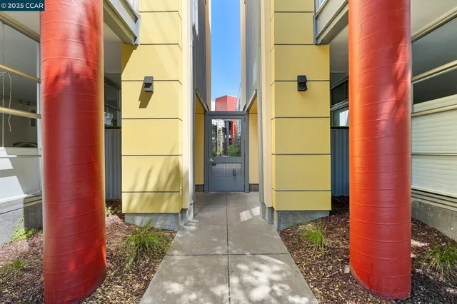 a view of a brick house with a large windows