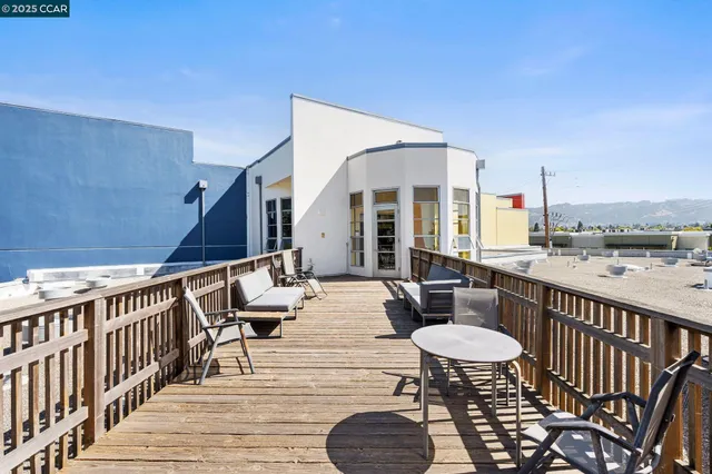 a view of a terrace with furniture