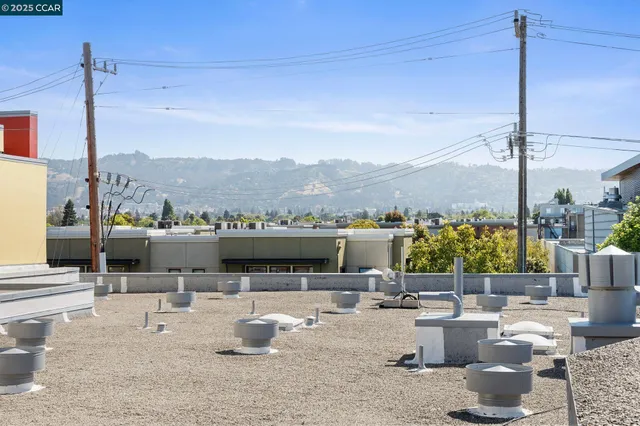 a outdoor kitchen with swimming pool and outdoor seating