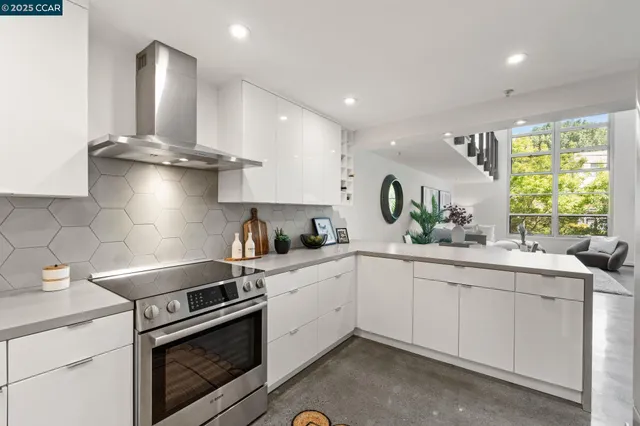 a kitchen with a sink cabinets and window
