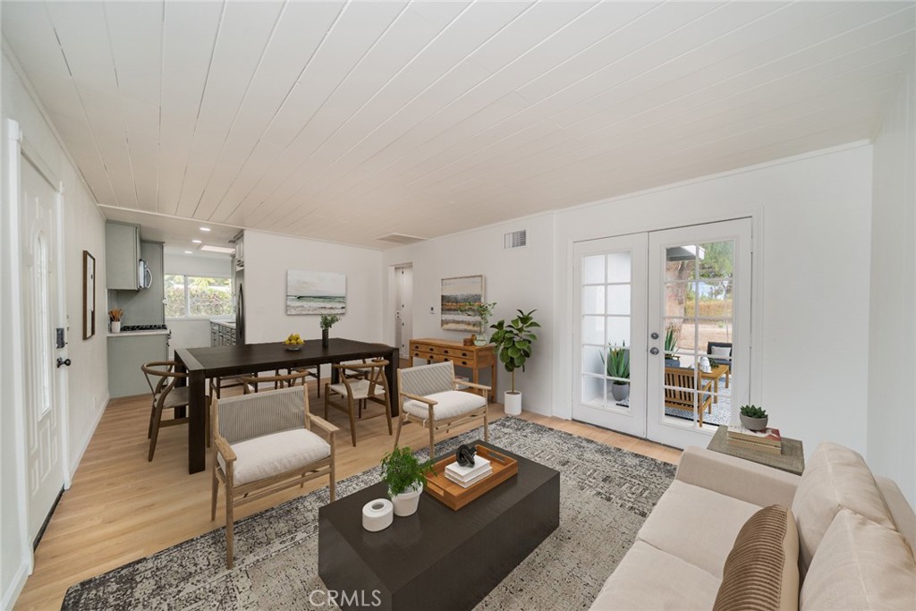 18863 8th Street Bloomington, CA 92316 - Photo 3 of 23 a living room with furniture and wooden floor