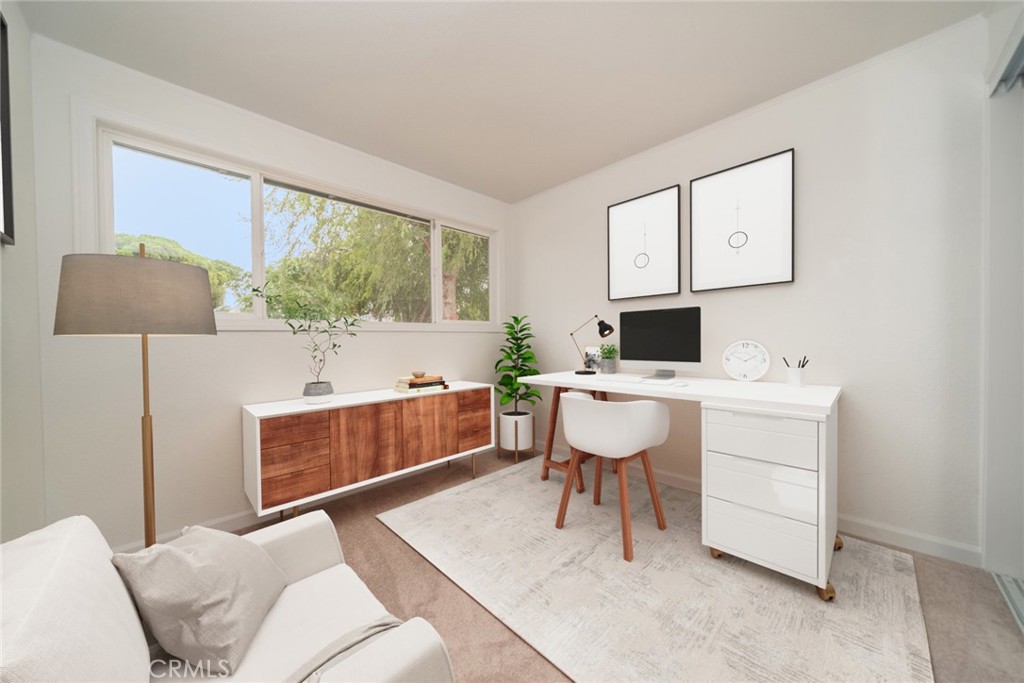 18863 8th Street Bloomington, CA 92316 - Photo 9 of 23 a living room with furniture a window and a flat screen tv