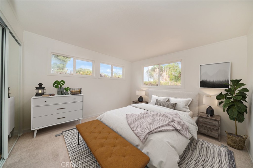 18863 8th Street Bloomington, CA 92316 - Photo 10 of 23 a bedroom with a bed and a dresser