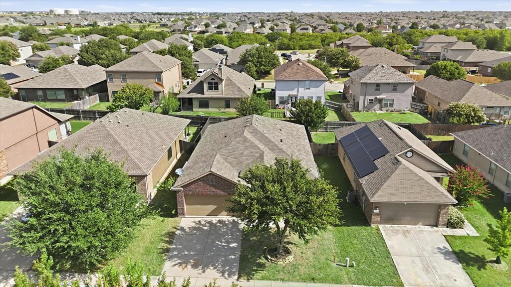 720 Rio Bravo Drive Fort Worth, TX 76052 - Photo 35 of 38 Aerial view showcasing residential properties with manicured lawns and mature trees