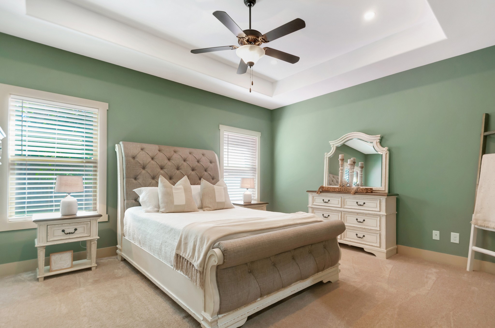 1118 Golf View Way Spring Hill, TN 37174 - Photo 15 of 30 a bedroom with a bed and a chandelier