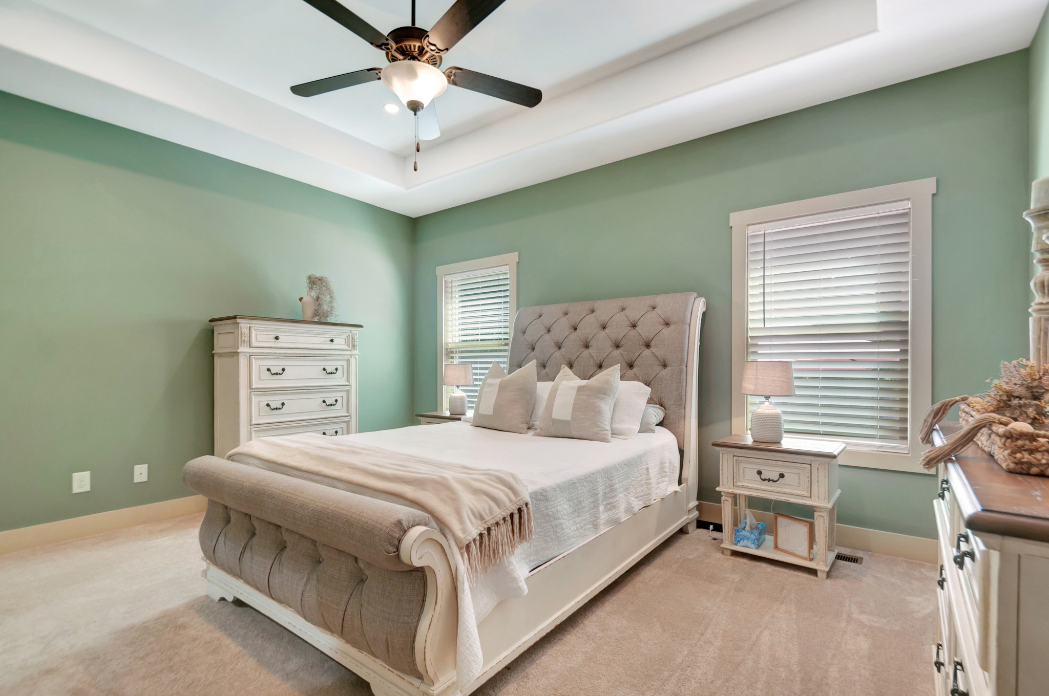 1118 Golf View Way Spring Hill, TN 37174 - Photo 16 of 30 a bedroom with a bed and a chandelier