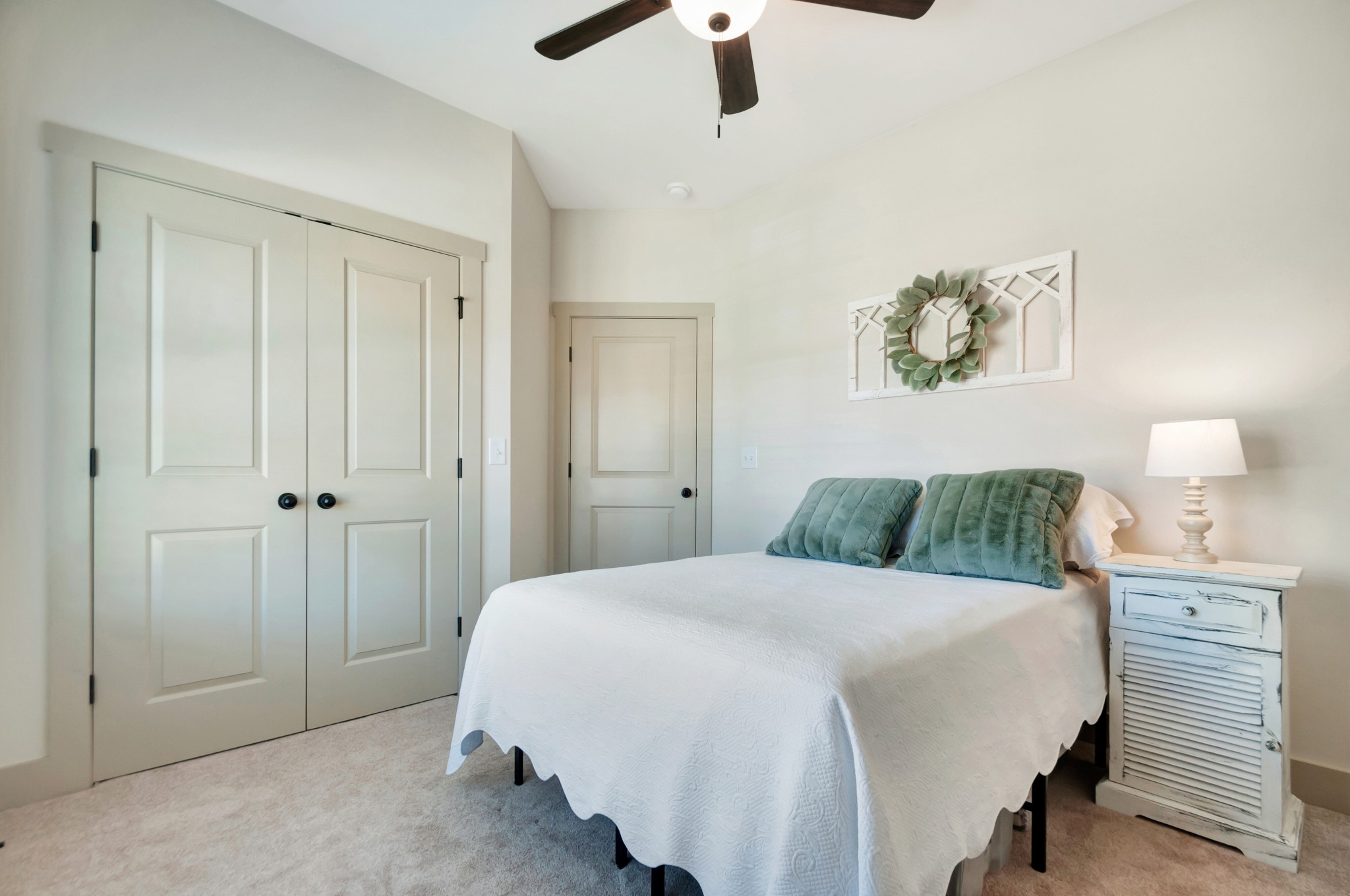 1118 Golf View Way Spring Hill, TN 37174 - Photo 18 of 30 a bedroom with a bed and a chandelier