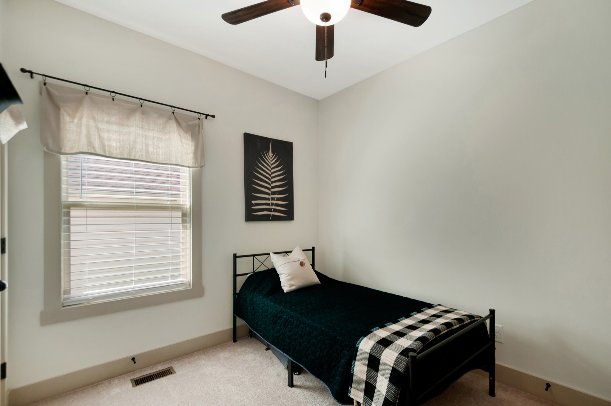 1118 Golf View Way Spring Hill, TN 37174 - Photo 19 of 30 a bedroom with a bed and a window