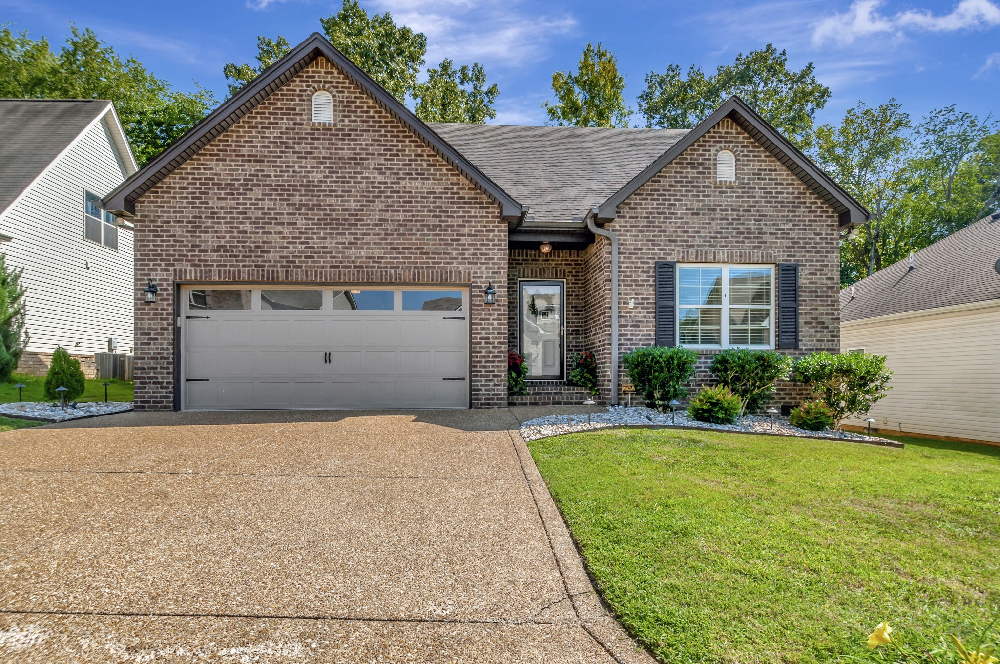 1118 Golf View Way Spring Hill, TN 37174 - Photo 2 of 30 a front view of a house with a yard