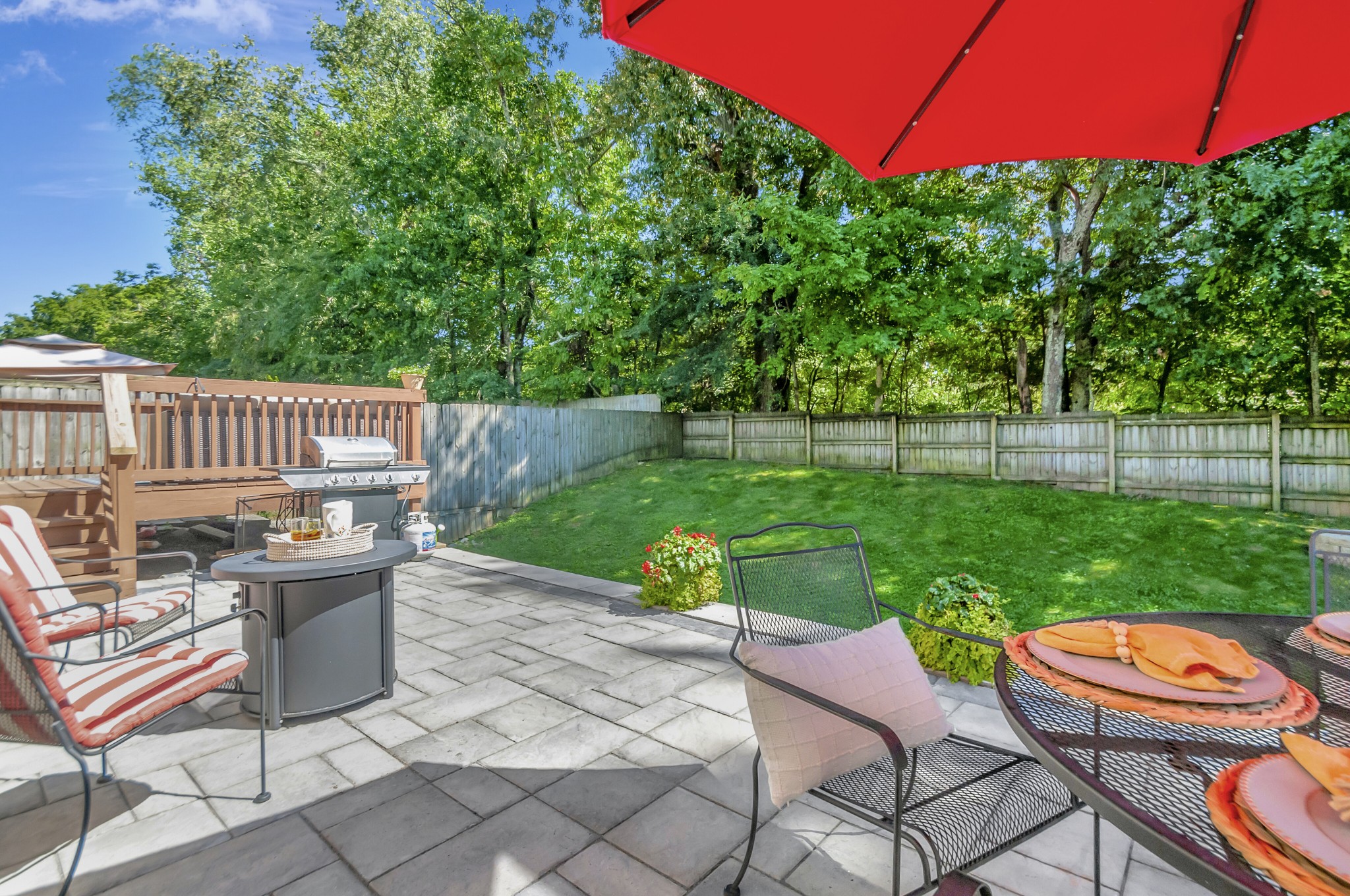 1118 Golf View Way Spring Hill, TN 37174 - Photo 25 of 30 a view of a chair and table in backyard yard