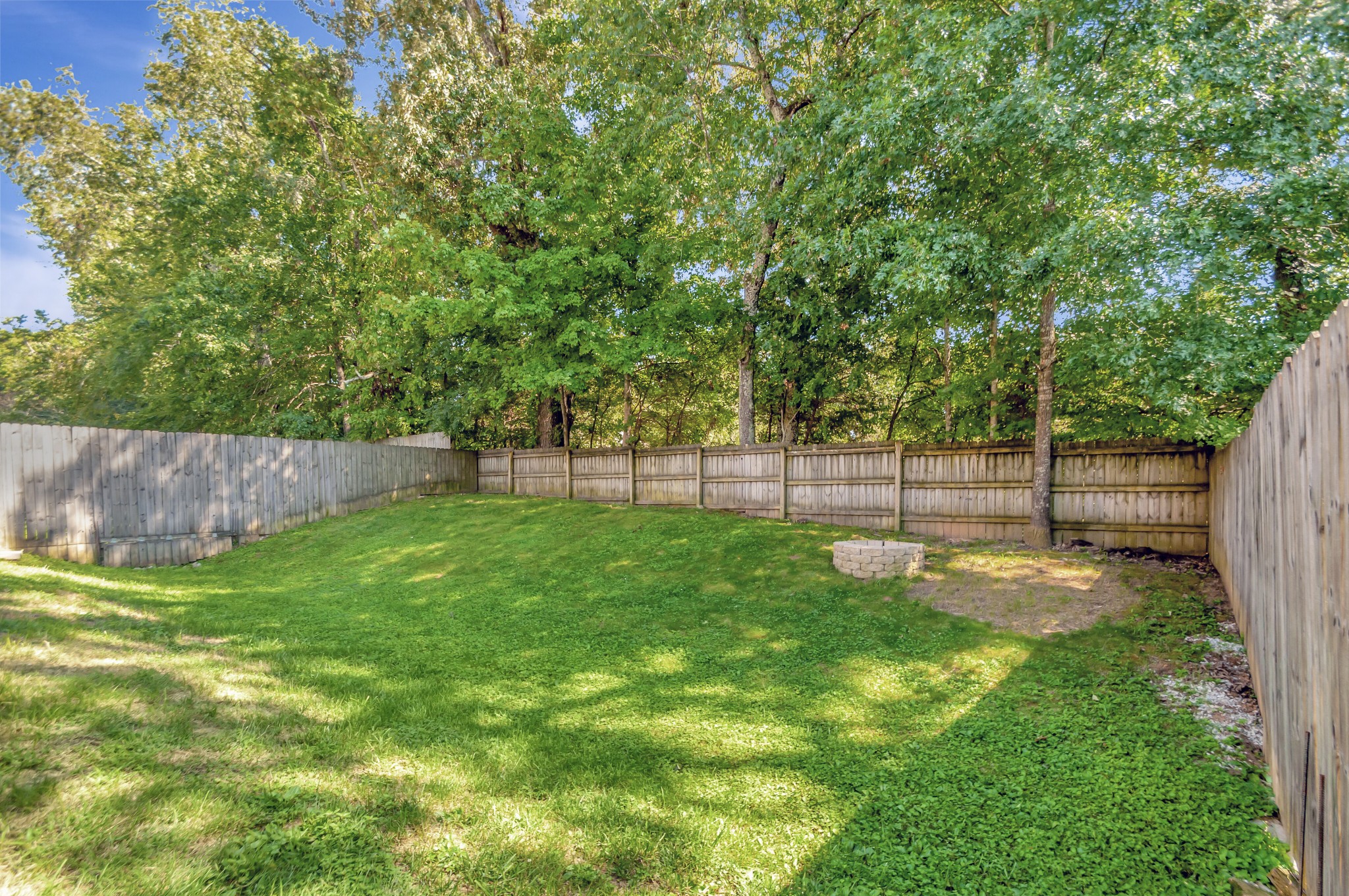 1118 Golf View Way Spring Hill, TN 37174 - Photo 30 of 30 a view of a backyard with a trees