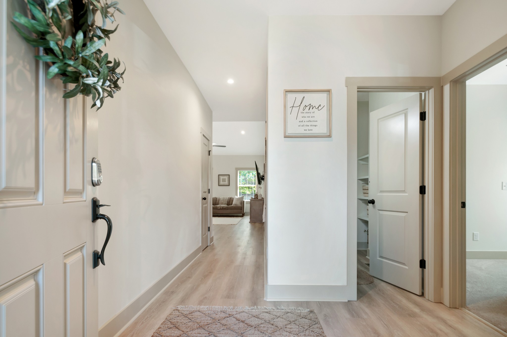 1118 Golf View Way Spring Hill, TN 37174 - Photo 3 of 30 a view of a hallway with a potted plant