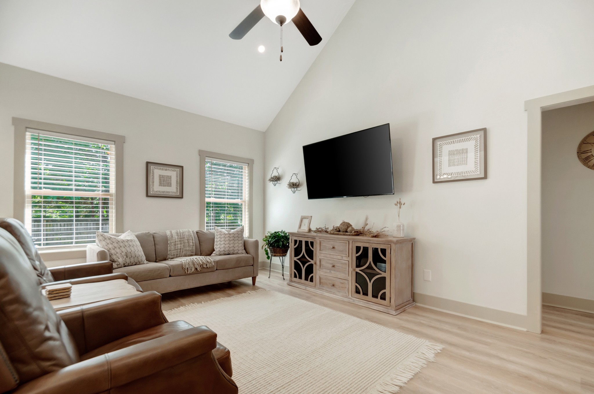 1118 Golf View Way Spring Hill, TN 37174 - Photo 6 of 30 a living room with furniture and a flat screen tv