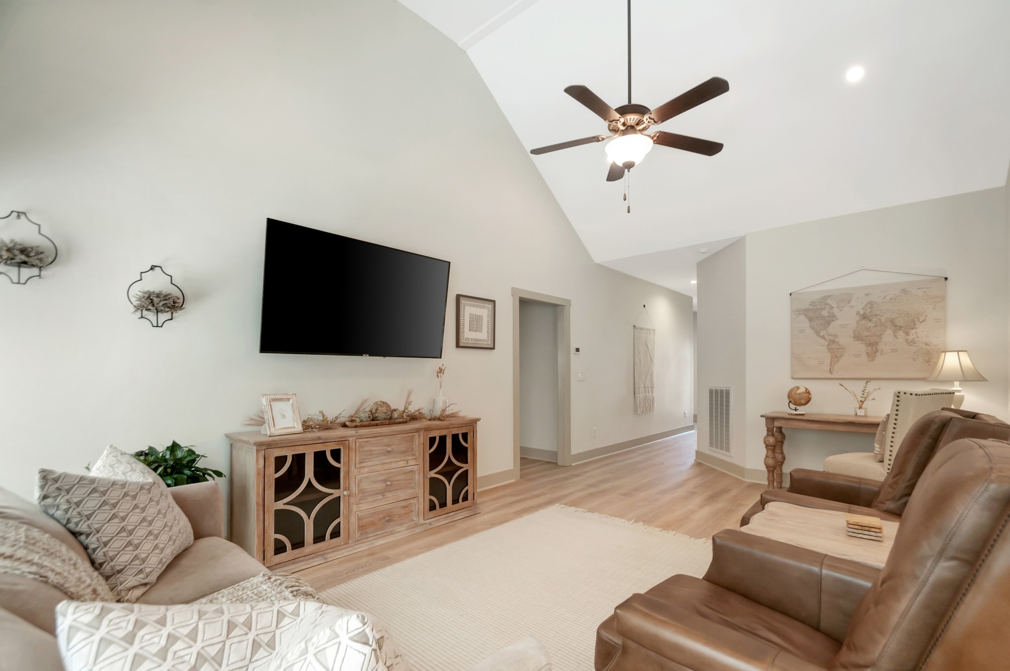 1118 Golf View Way Spring Hill, TN 37174 - Photo 7 of 30 a living room with furniture and a flat screen tv