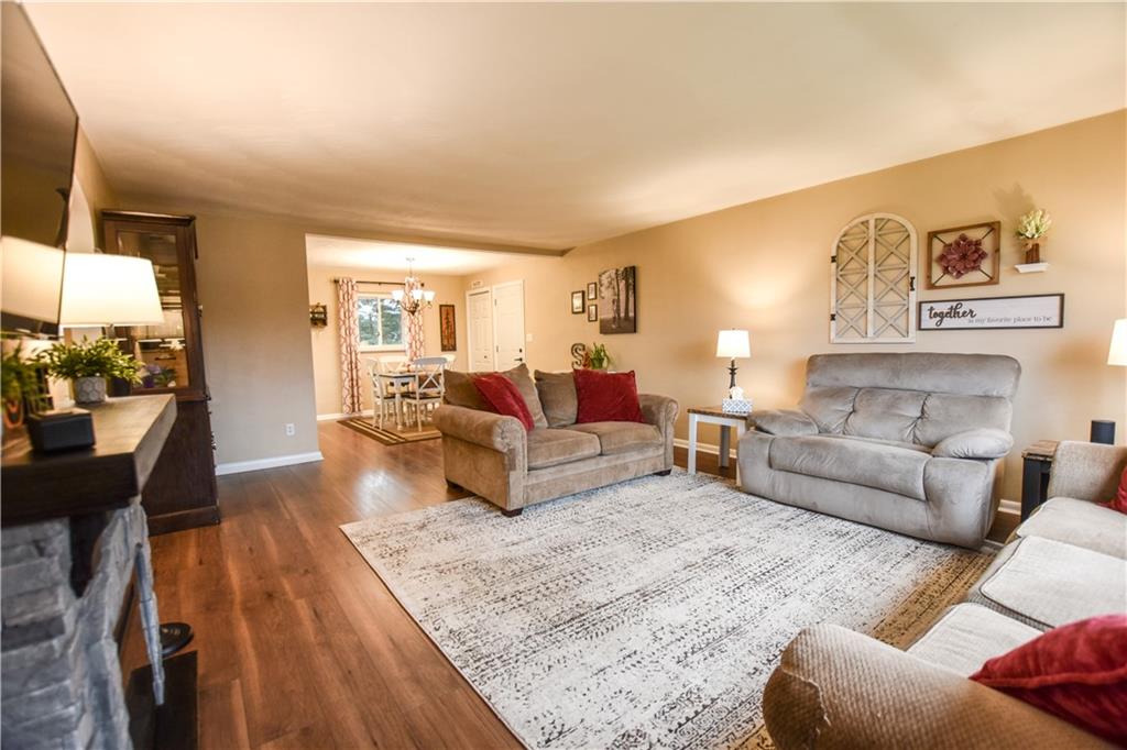 107 Cole Road Sarver, PA 16055 - Photo 4 of 21 a living room with furniture and a fireplace