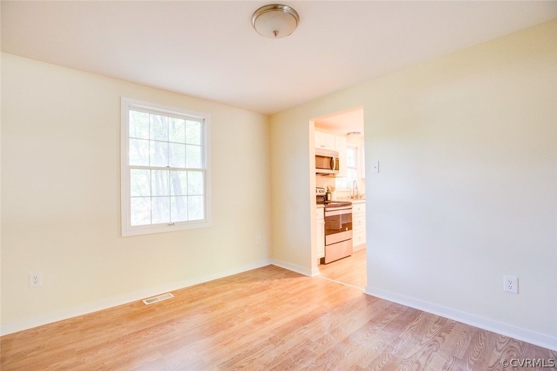 9302 Radborne Road Chesterfield, VA 23236 - Photo 17 of 48 an empty room with windows