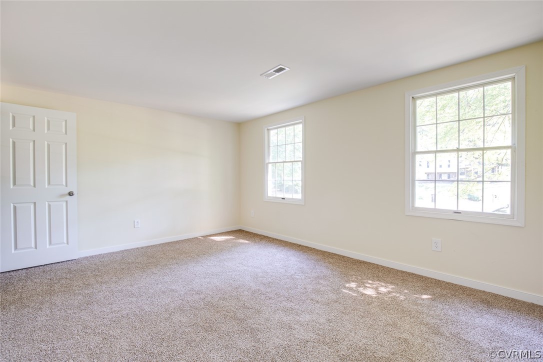 9302 Radborne Road Chesterfield, VA 23236 - Photo 22 of 48 an empty room with windows