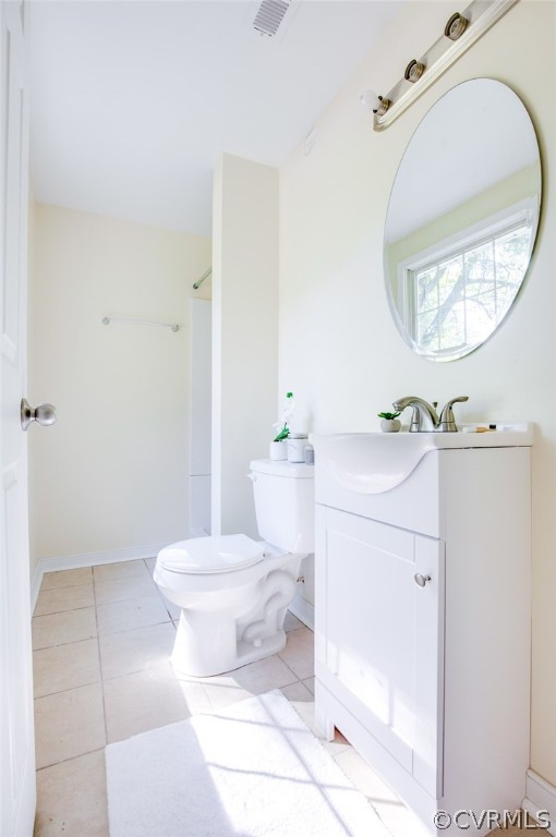 9302 Radborne Road Chesterfield, VA 23236 - Photo 32 of 48 a bathroom with a sink a toilet and a mirror