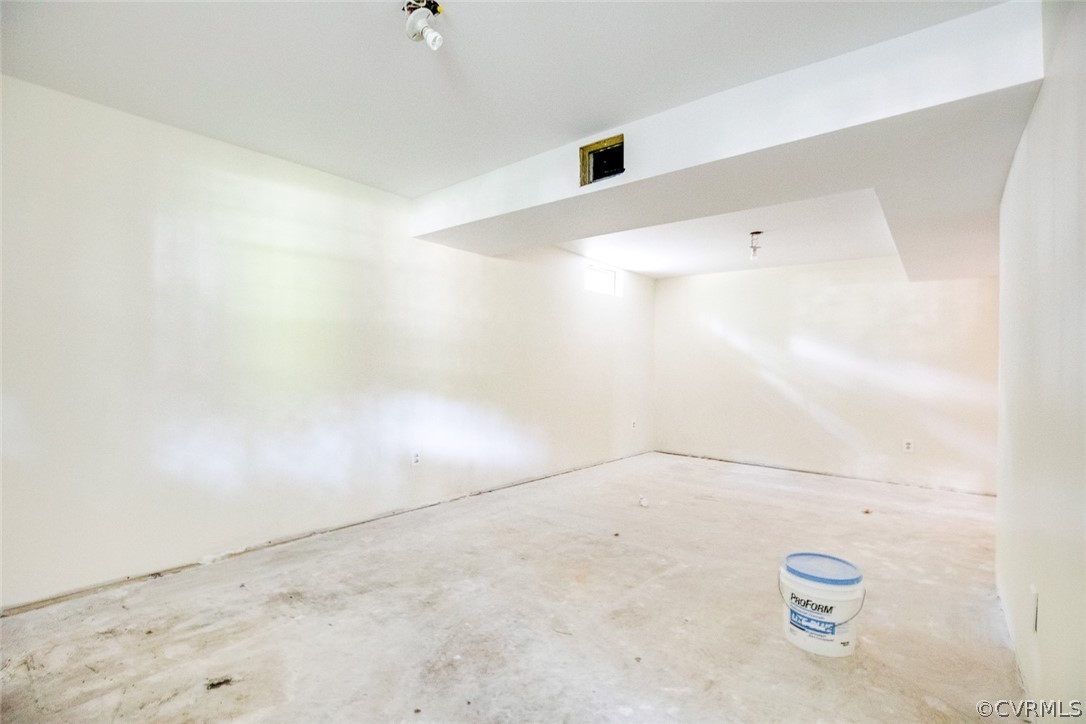 9302 Radborne Road Chesterfield, VA 23236 - Photo 38 of 48 a view of a livingroom with an empty space