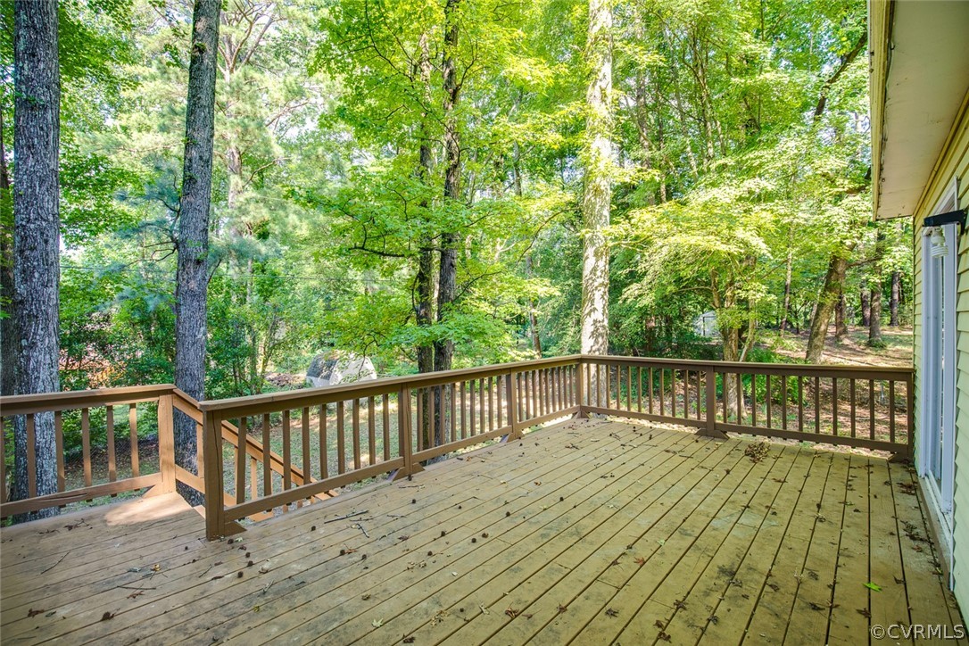 9302 Radborne Road Chesterfield, VA 23236 - Photo 42 of 48 a view of balcony with wooden floor and fence