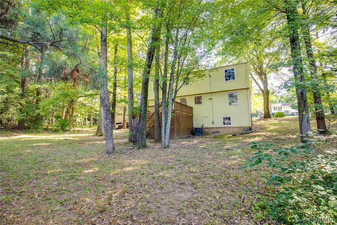 9302 Radborne Road Chesterfield, VA 23236 - Photo 45 of 48 a view of a house with backyard and tree