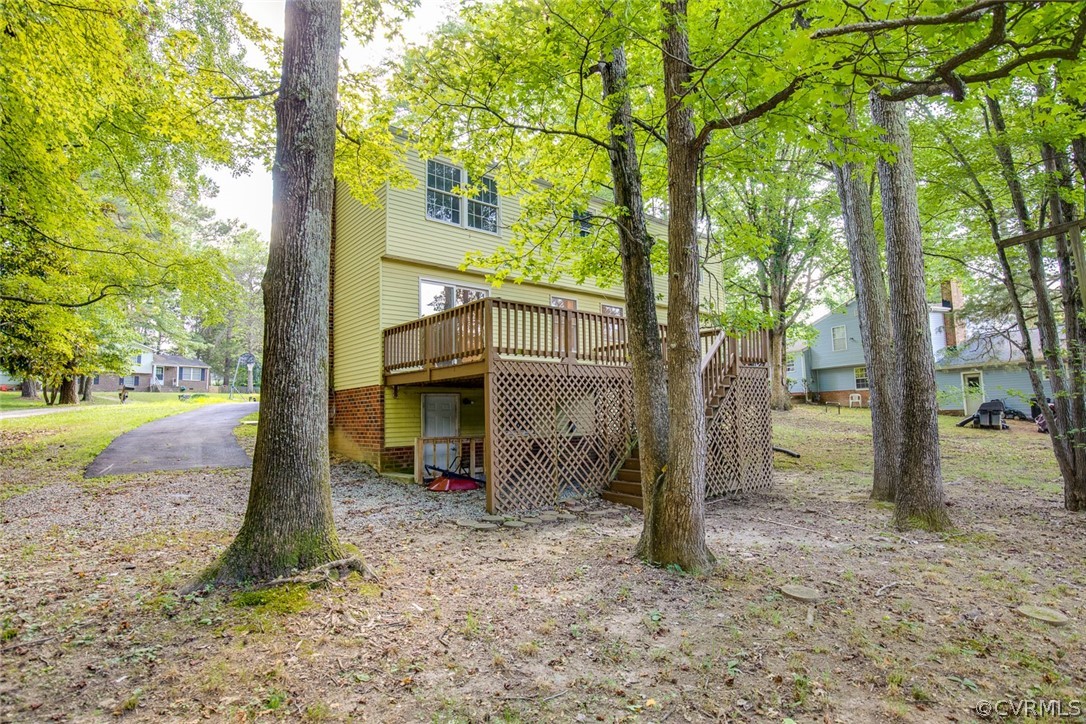 9302 Radborne Road Chesterfield, VA 23236 - Photo 47 of 48 a view of a house with backyard and tree